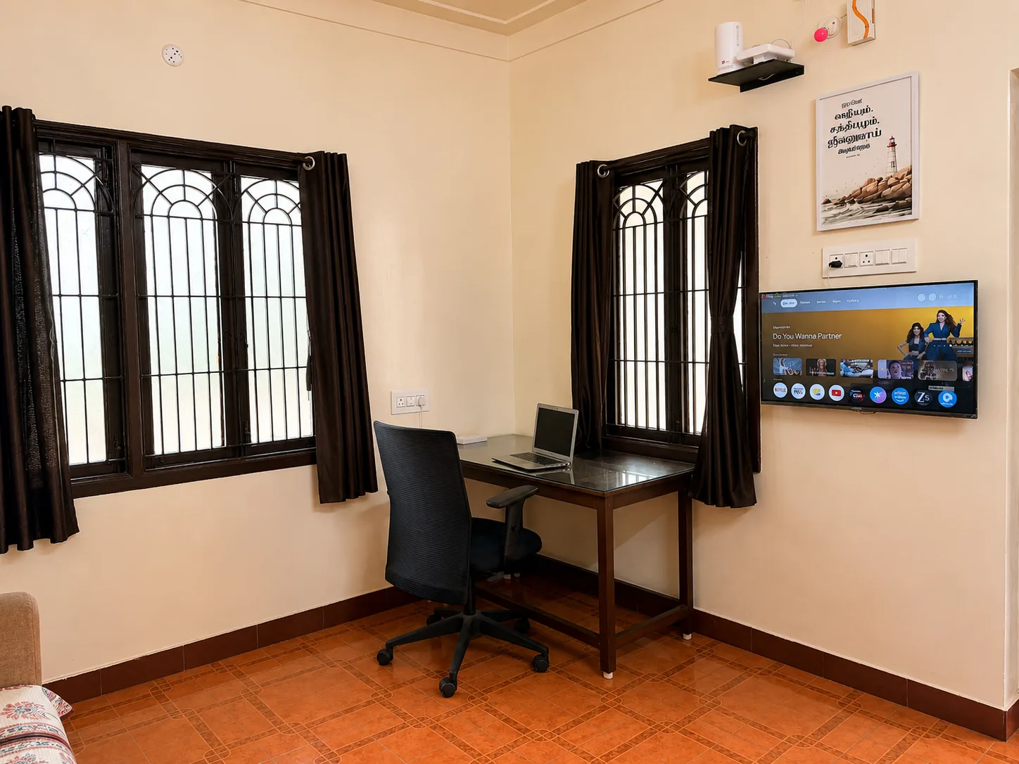 Shalom Deo living area and workspace in Avadi